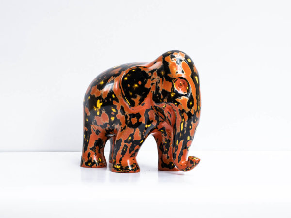 Green Signature Home Décor, a rare sustainable papier mache art deco sculpture- The Welcoming Black and Red Elephant