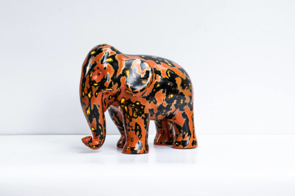 Green Signature Home Décor, a rare sustainable papier mache art deco sculpture- The Welcoming Black and Red Elephant