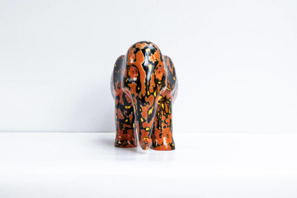 Green Signature Home Décor, a rare sustainable papier mache art deco sculpture- The Welcoming Black and Red Elephant