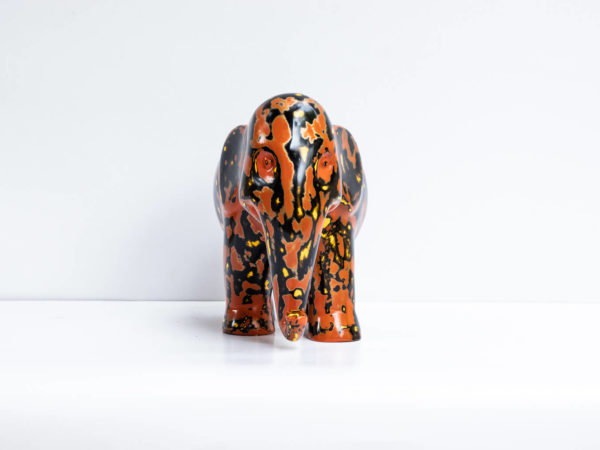 Green Signature Home Décor, a rare sustainable papier mache art deco sculpture- The Welcoming Black and Red Elephant