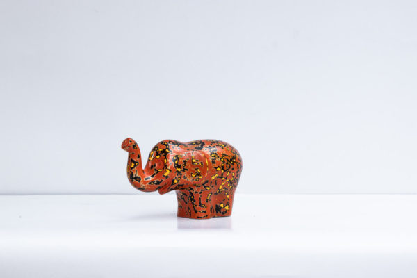 Green Signature Home Décor, a rare sustainable papier mache art deco sculpture- The Cheering Red and Black Elephant