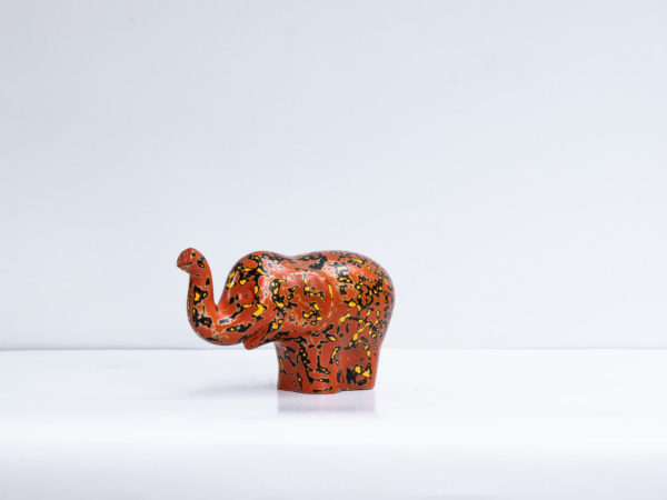 Green Signature Home Décor, a rare sustainable papier mache art deco sculpture- The Cheering Red and Black Elephant