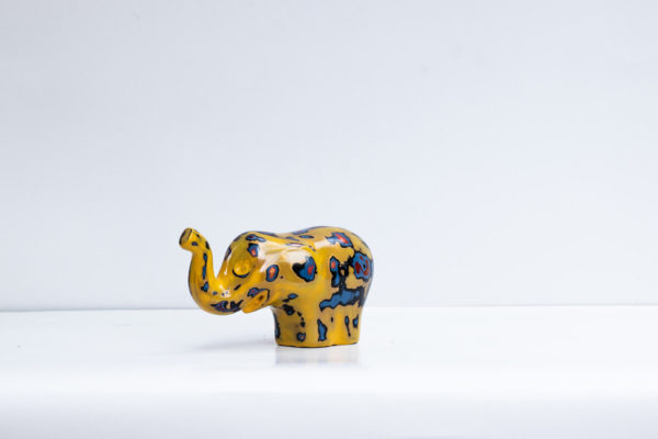 Green Signature Home Décor, a rare sustainable papier mache art deco sculpture- The Cheering Yellow and Blue Elephant