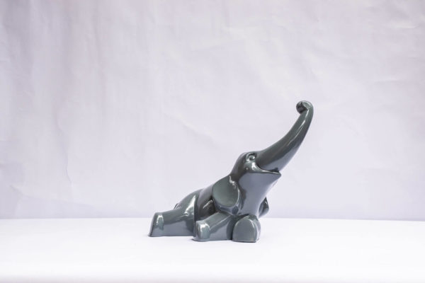 Funny lacquered elephant sculpture. The Charming Grey Elephant