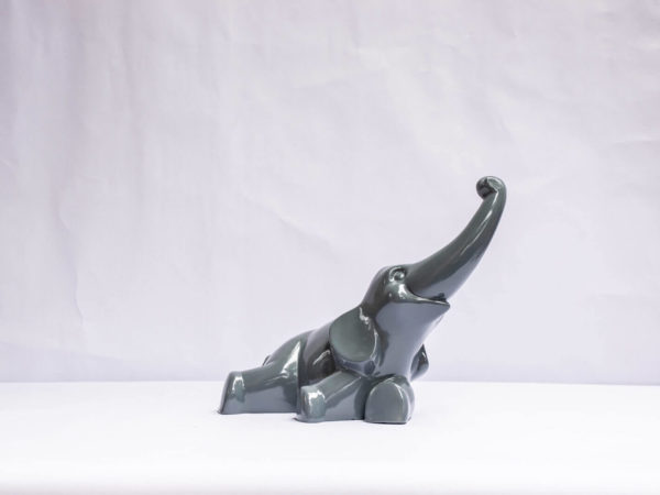 Funny lacquered elephant sculpture. The Charming Grey Elephant